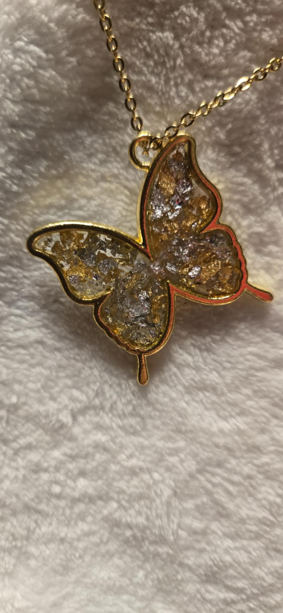 Butterfly Necklace filled with gold and silver leaf