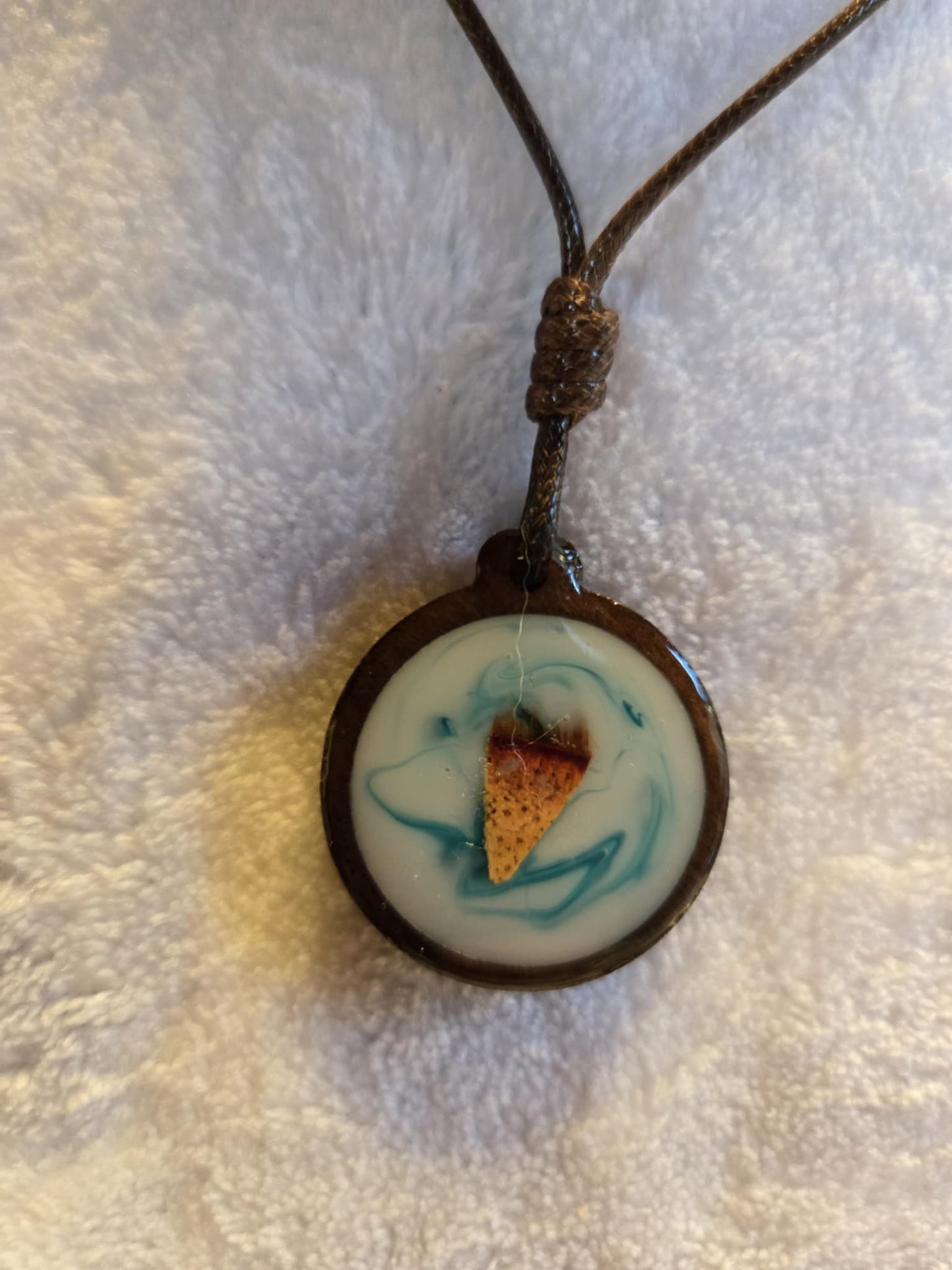 Lobster Notch Necklace wooden base